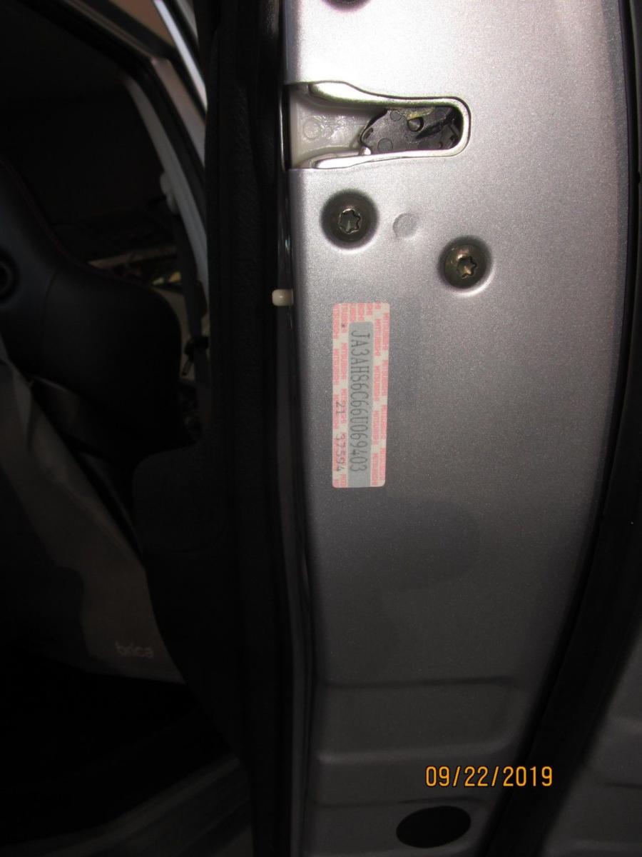  Mitsubishi Lancer Evolution IX MR 2006 года  (фото 61 из 69)